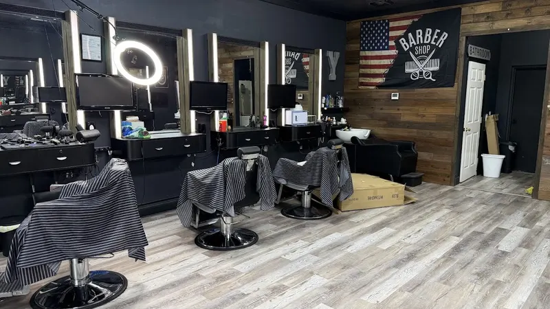 Three chairs facing the mirrors with LED bars