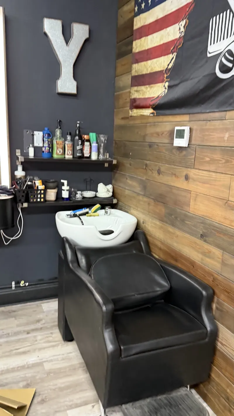 Wash station next to the flag and the letter Y on the wall