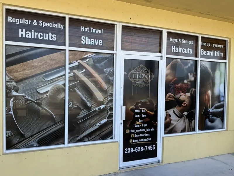 Window of the shop with the service list and phone number